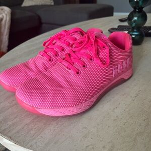 Neon Pink Nobull shoes